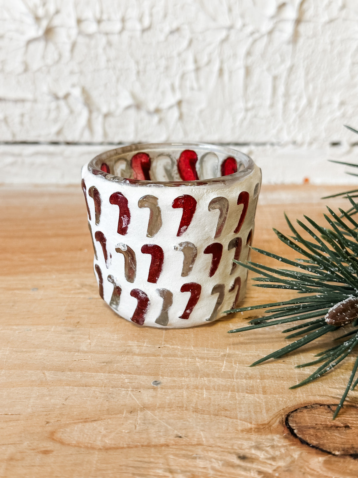 festive glass mosaic candy cane red and white votive holder at The Rustic Barn in Killingworth CT
