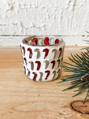 festive glass mosaic candy cane red and white votive holder at The Rustic Barn in Killingworth CT