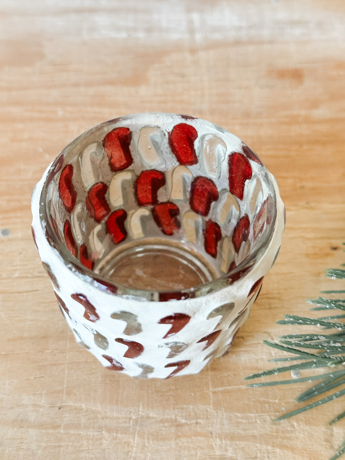 festive glass mosaic candy cane red and white votive holder at The Rustic Barn in Killingworth CT