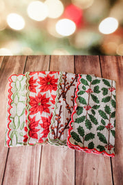 Festive green red and white holiday christmas napkins set of 4 with white berries, poinsettias, holly, red berries, and christmas prints with scalloped edge for sale at the rustic barn in killingworth, CT