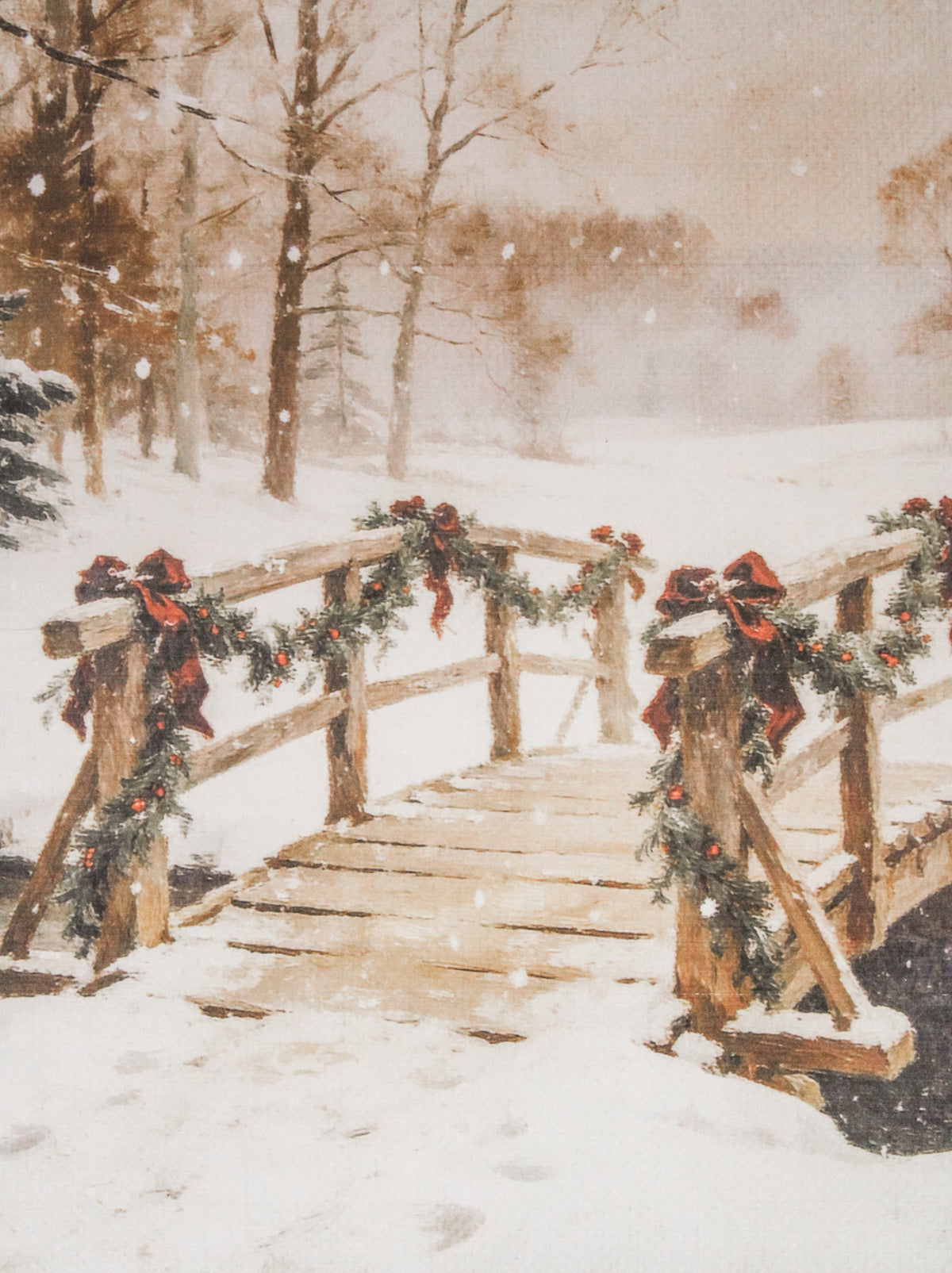 Festive winter bridge in snowy scene with red bows and evergreen garland for christmas wall art for sale at the rustic barn in killingworth, CT
