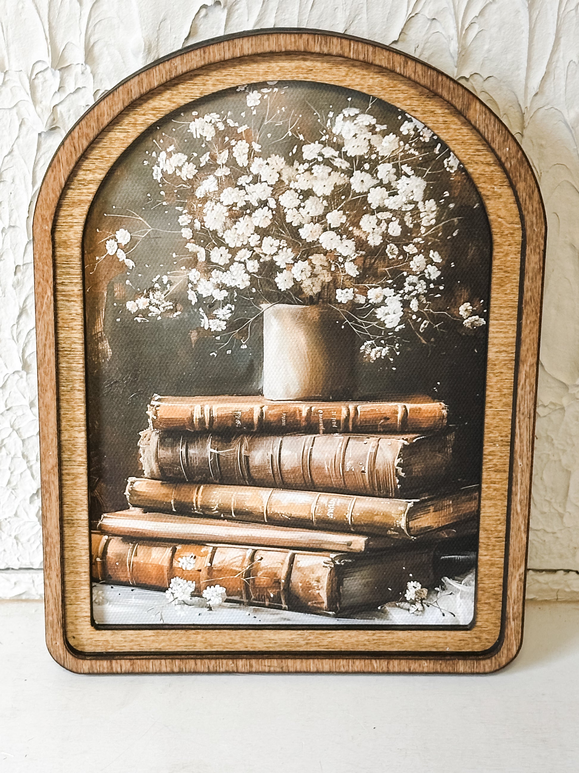 Floral Book Stack Arch Top Framed Canvas at the Rustic Barn in Killingworth, CT