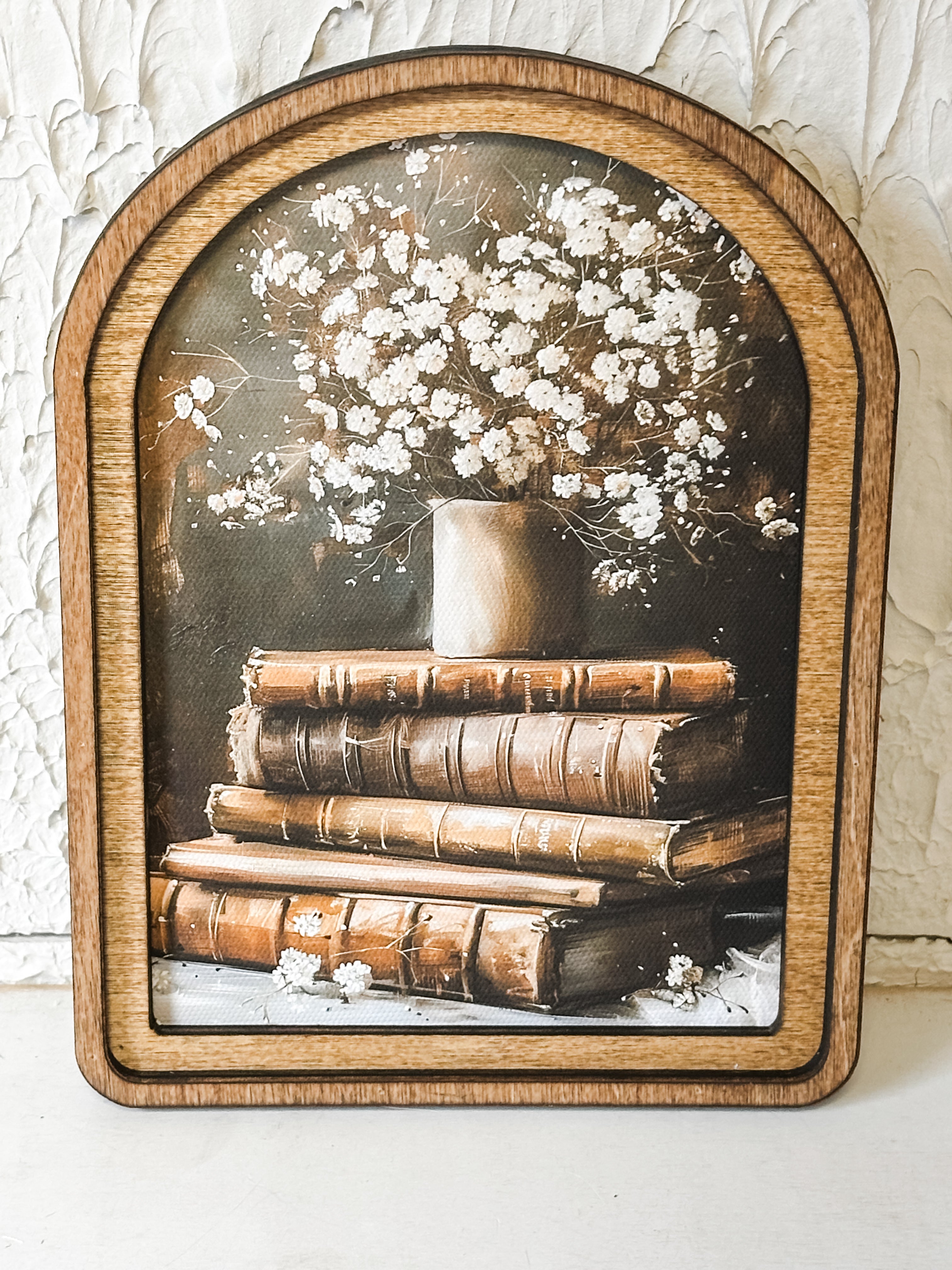 Floral Book Stack Arch Top Framed Canvas at the Rustic Barn in Killingworth, CT