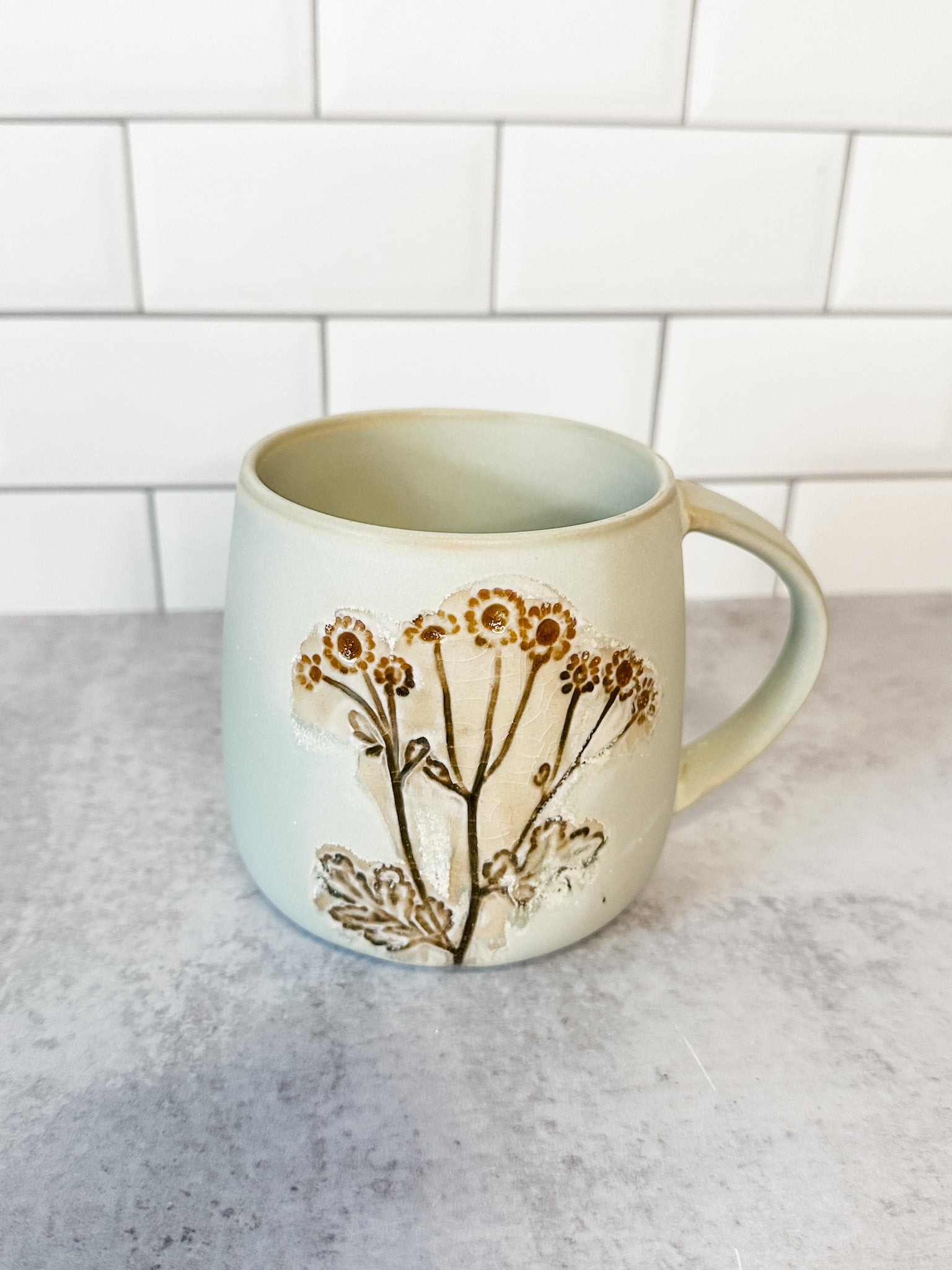 Floral hand painted stoneware mugs for fall for sale at the rustic barn in killingworth, CT