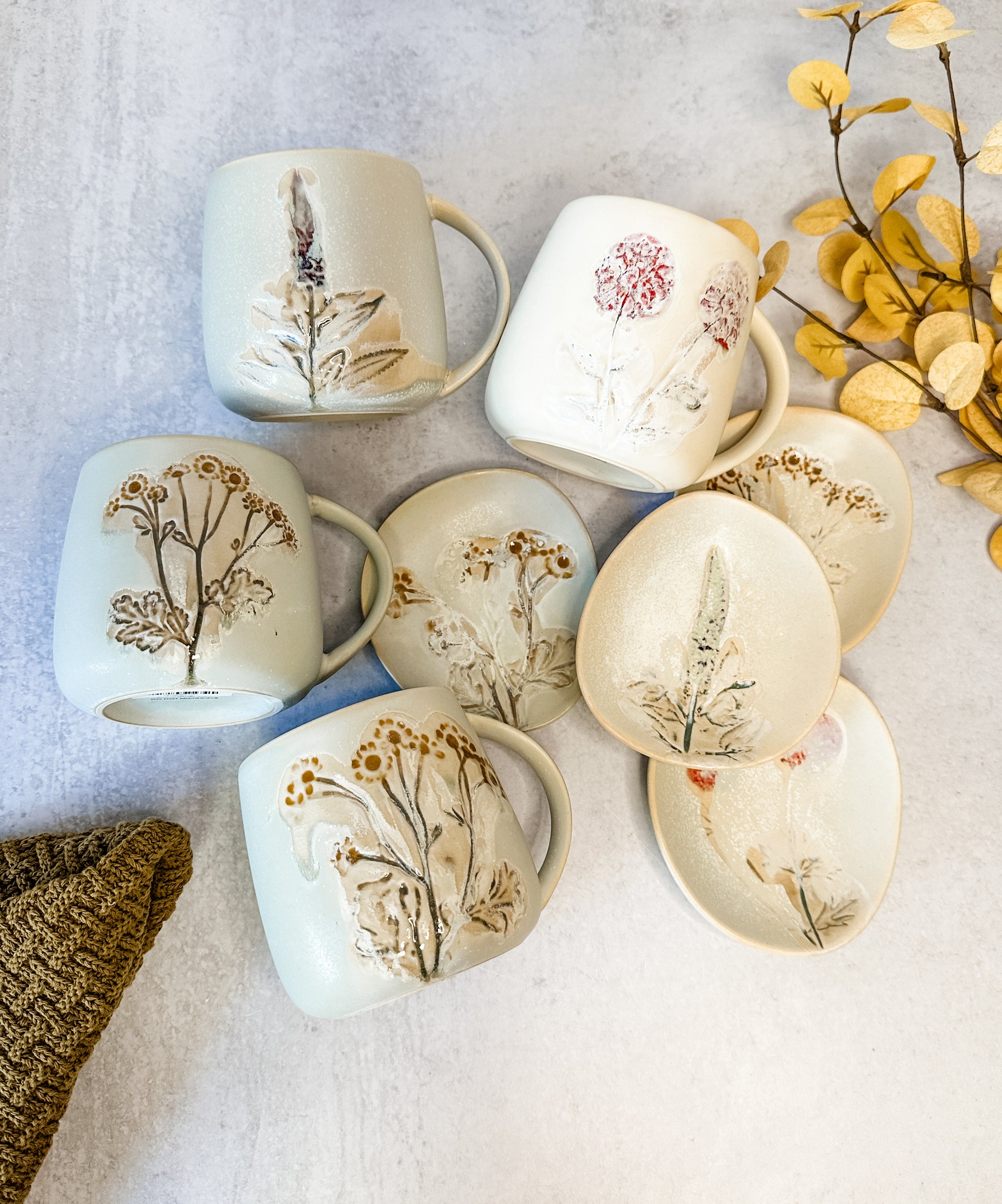Floral hand painted stoneware mugs and plates for fall for sale at the rustic barn in killingworth, CT