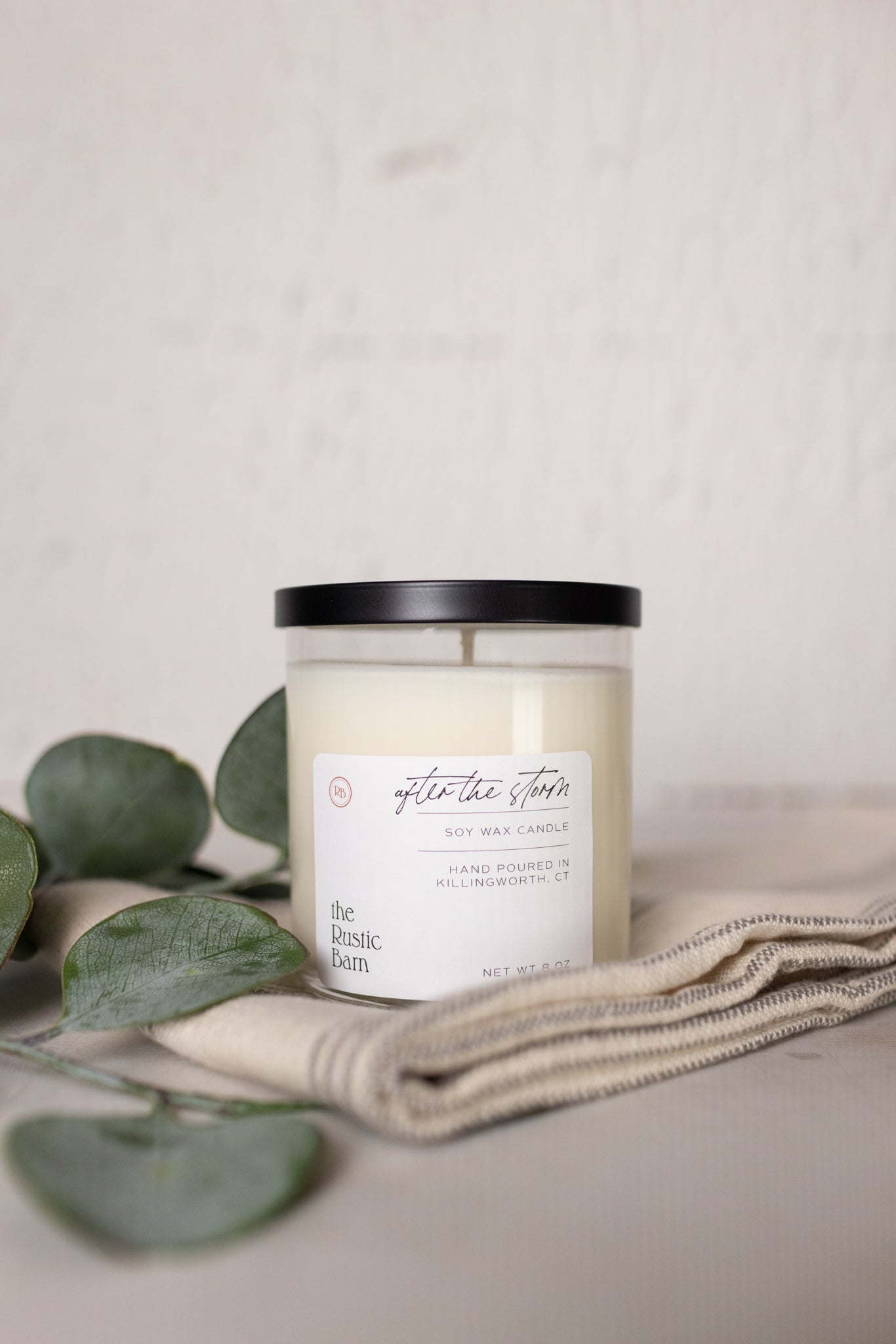 fresh linen and sea salt hand poured soy candle at the rustic barn in killingworth ct