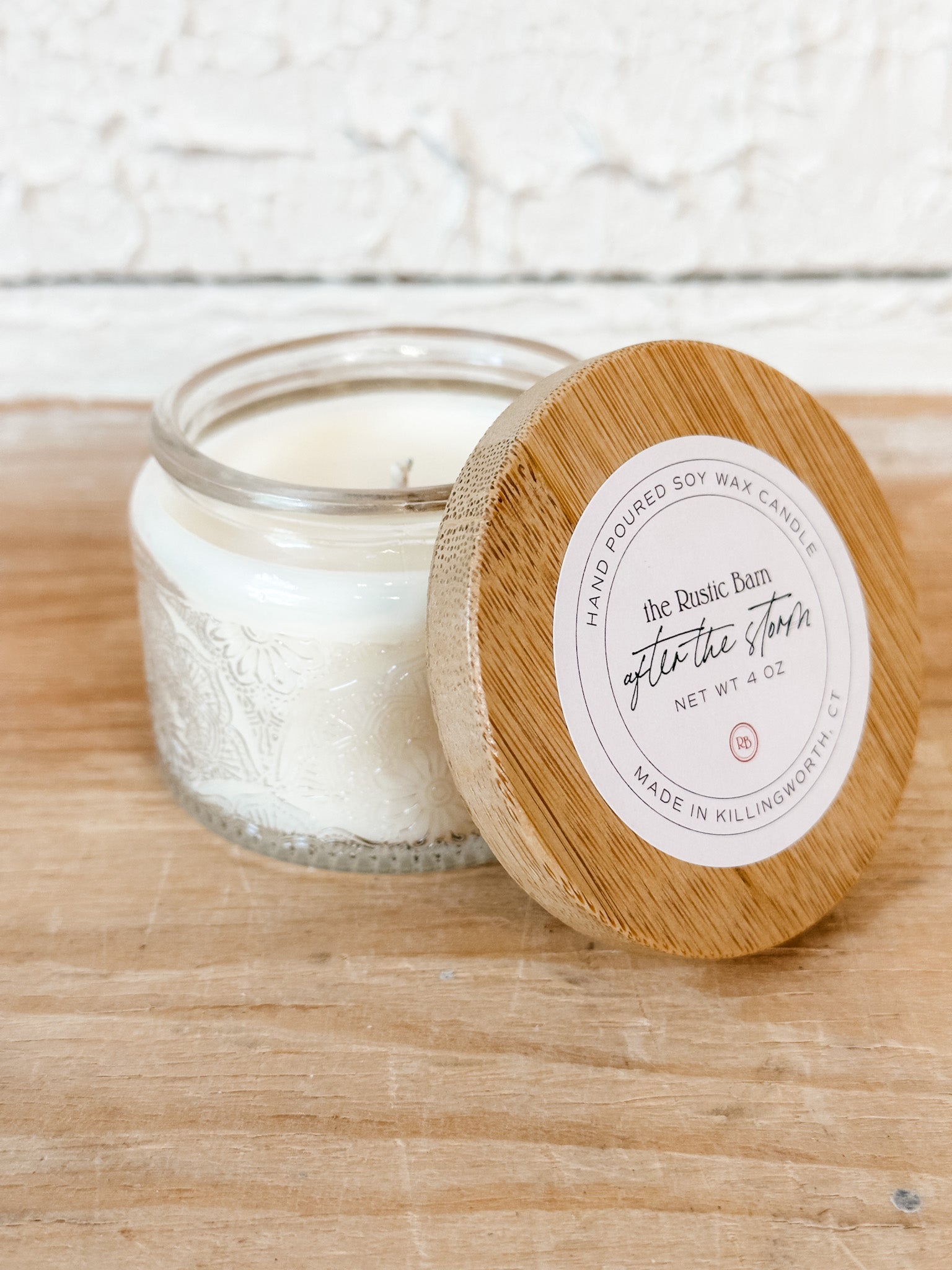 fresh linen and sea salt hand poured soy candle at the rustic barn in killingworth ct