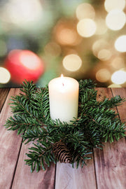 Frosted glacier ultra realistic candle ring with pinecones and greenery for winter and christmas for sale at the rustic barn in Killingworth, CT
