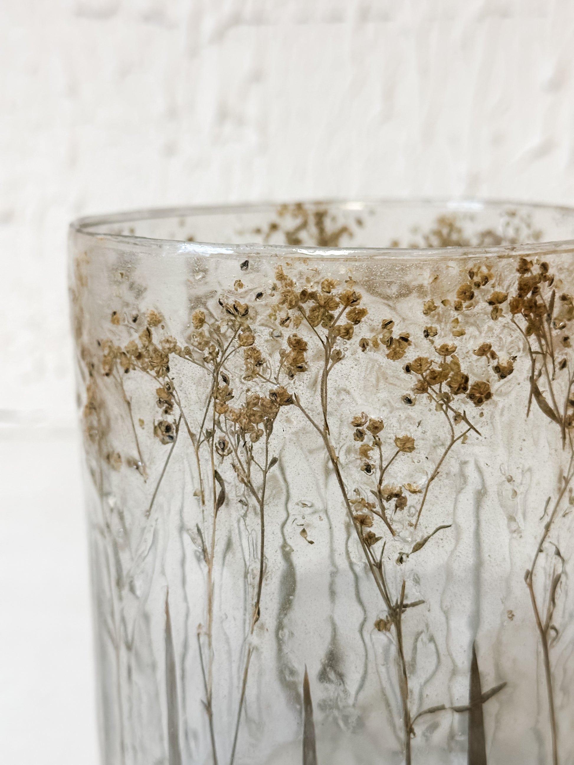 glass candle holder with pressed baby's breath at The Rustic Barn in Killingworth, CT