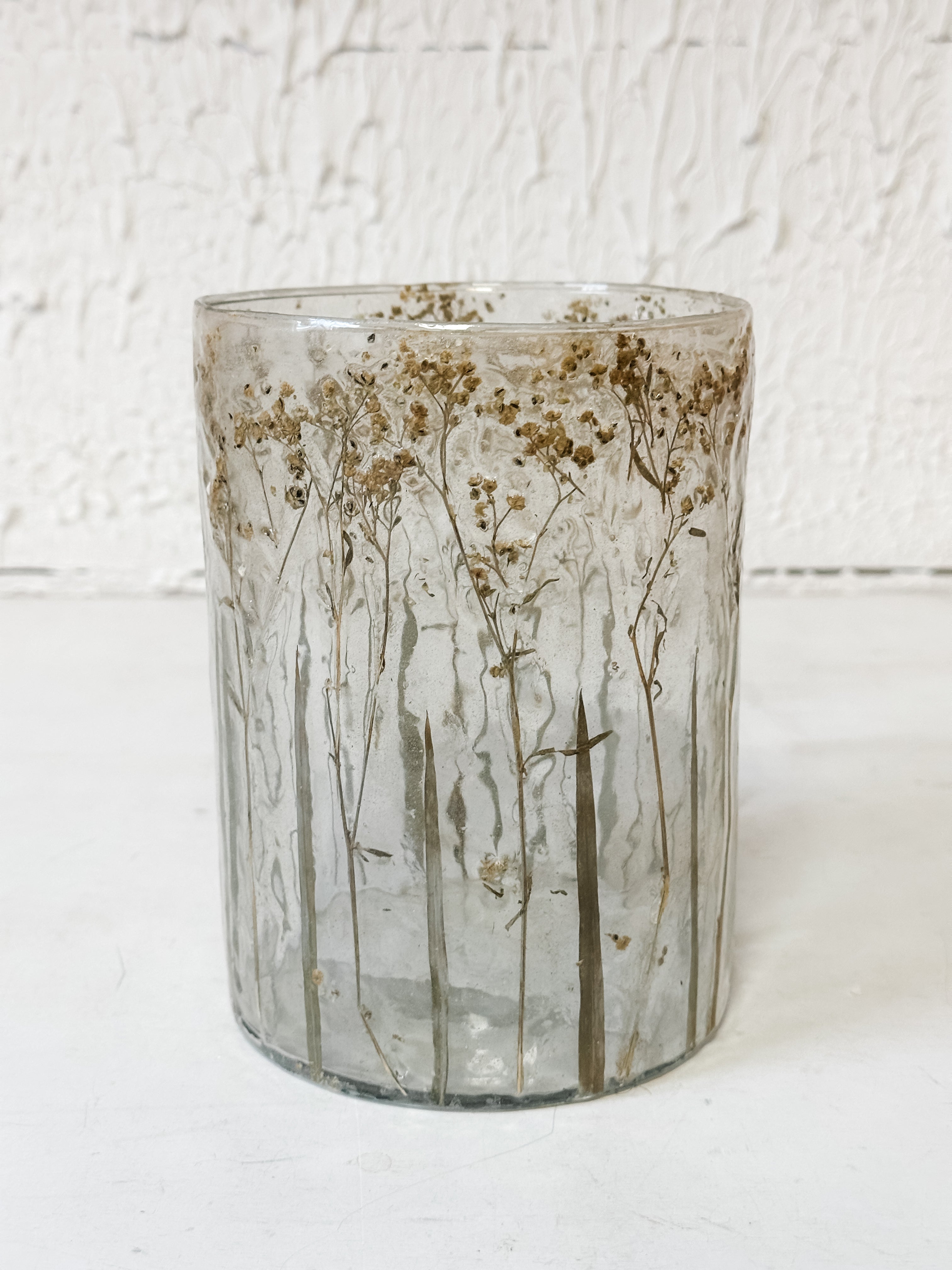glass candle holder with pressed baby's breath at The Rustic Barn in Killingworth, CT