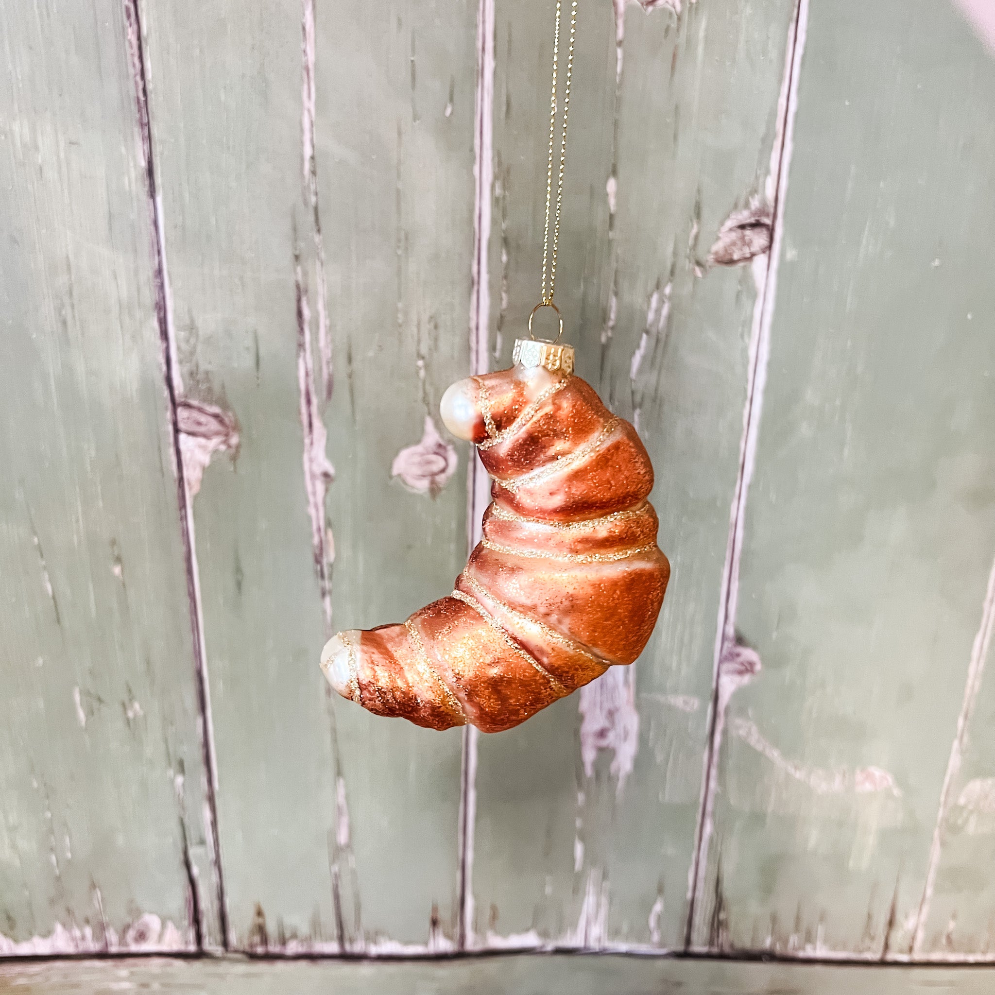 Glass Croissant Ornament With Glitter