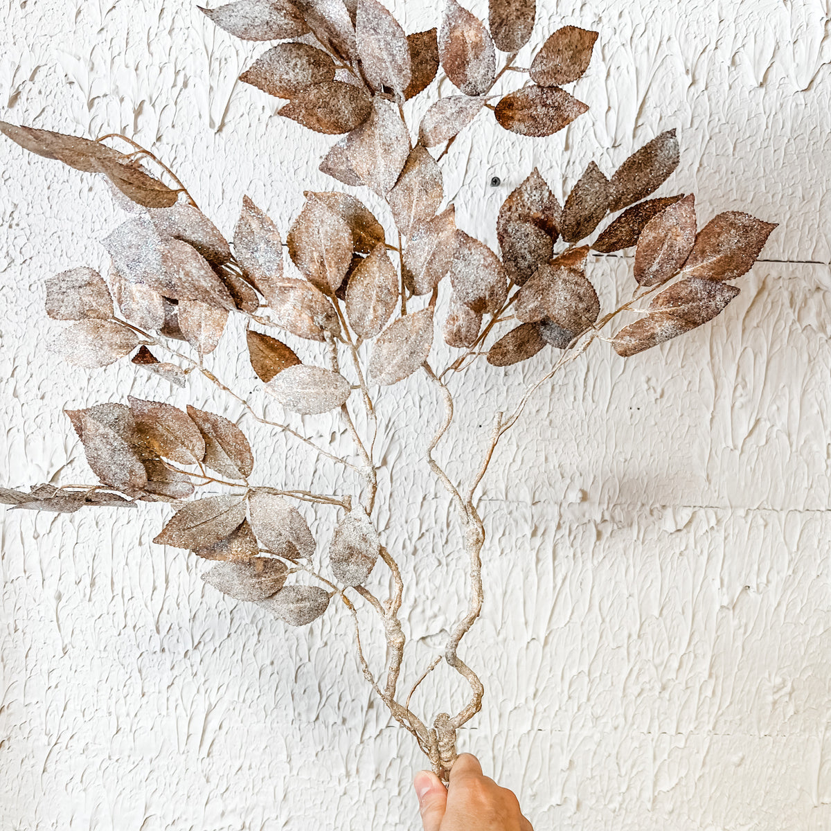 glittered rose colored leaf spray with sparkles at the rustic barn in killingworth ct