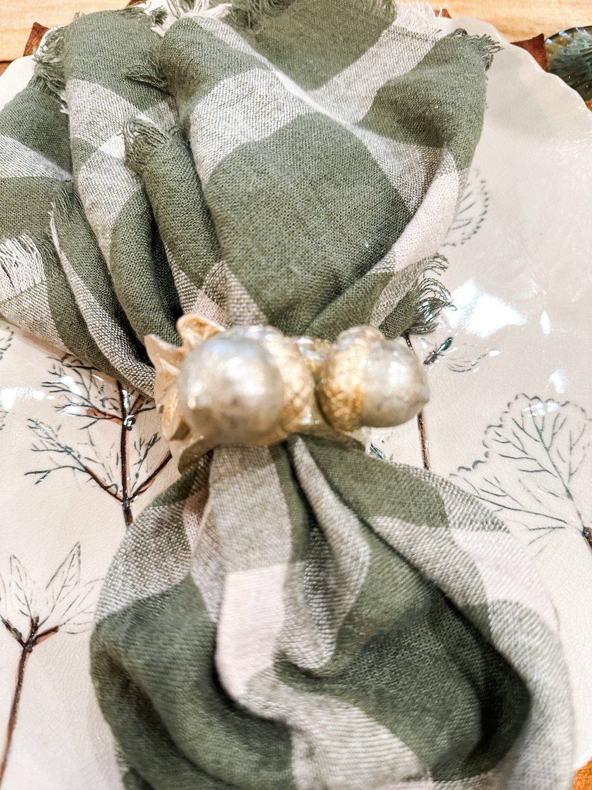 gold acorn napkin rings at the rustic barn in killingworth ct