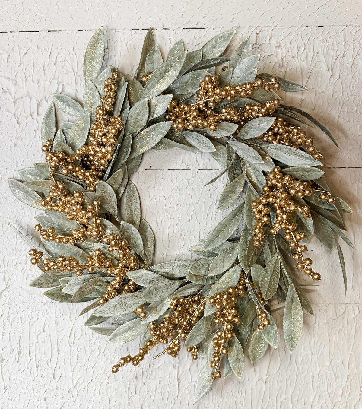 gilded gold berry and bay leaf holiday wrap wreath for the christmas season for sale at the rustic barn in killingworth, CT