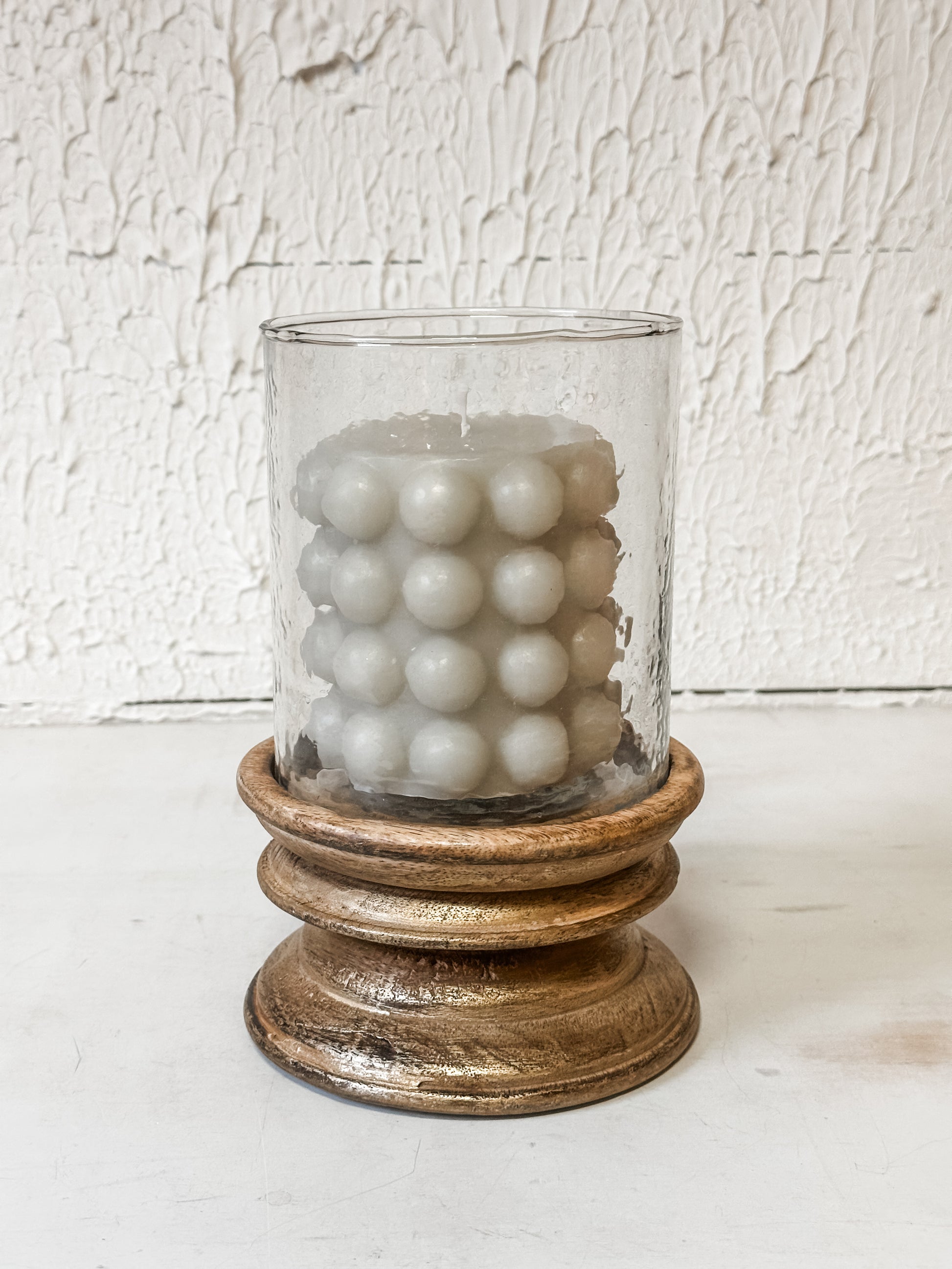 gold brush wood and glass pillar holder at The Rustic Barn in Killingworth, CT