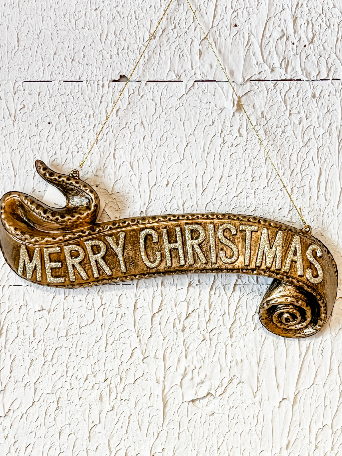 gold hanging christmas banner ornament at the rustic barn in killingworth ct