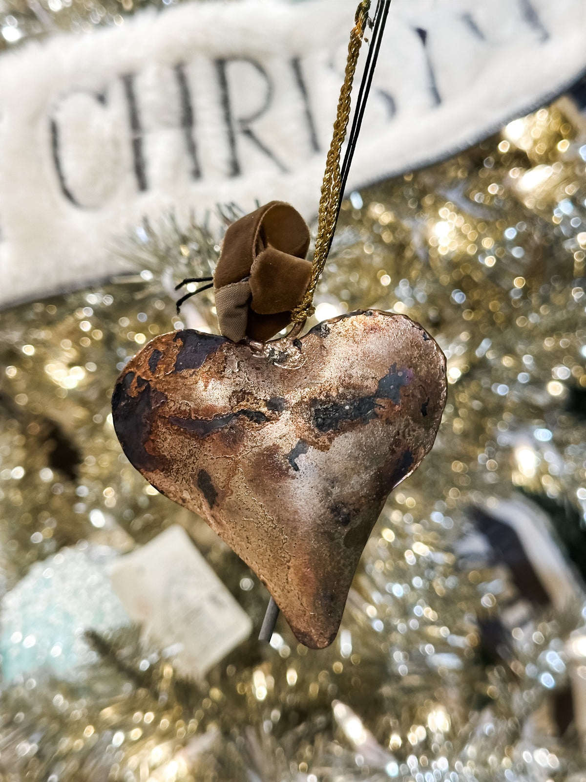 gold metal heart shaped ornament at The Rustic Barn in Killingworth CT