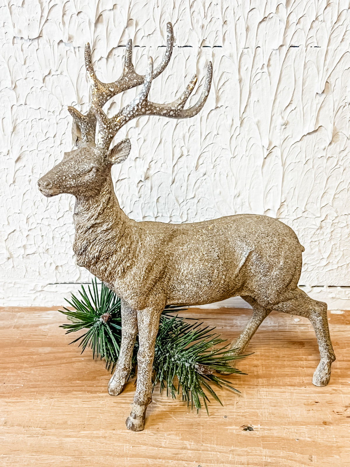 gold resin standing deer at the rustic barn in killingworth ct