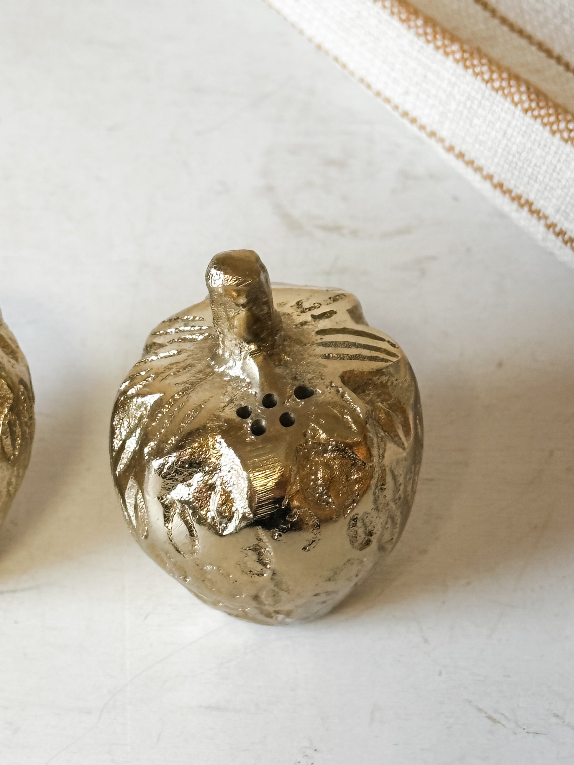 golden strawberry cast aluminum salt and pepper shaker set at the rustic barn in killingworth ct