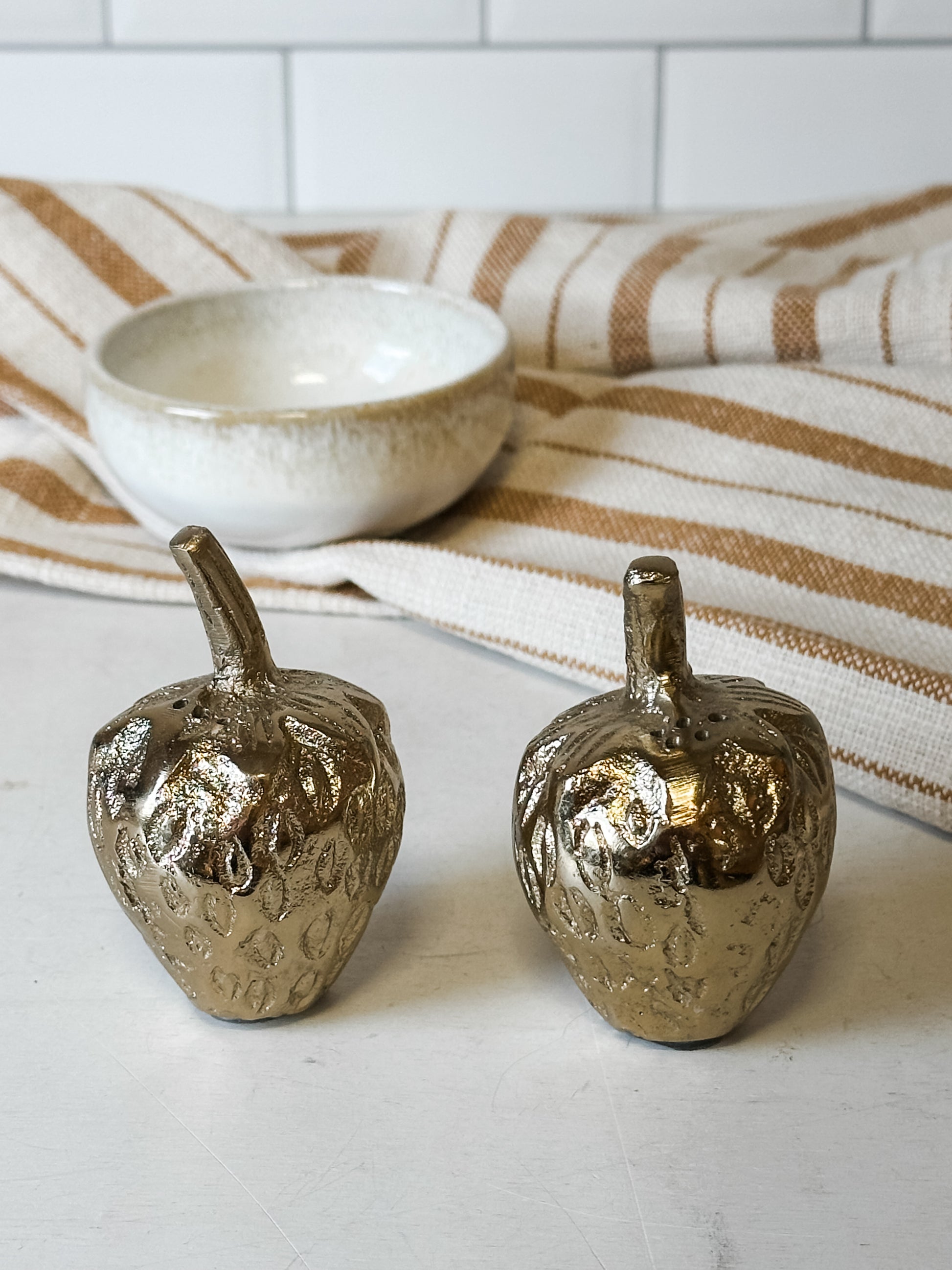 golden strawberry cast aluminum salt and pepper shaker set at the rustic barn in killingworth ct