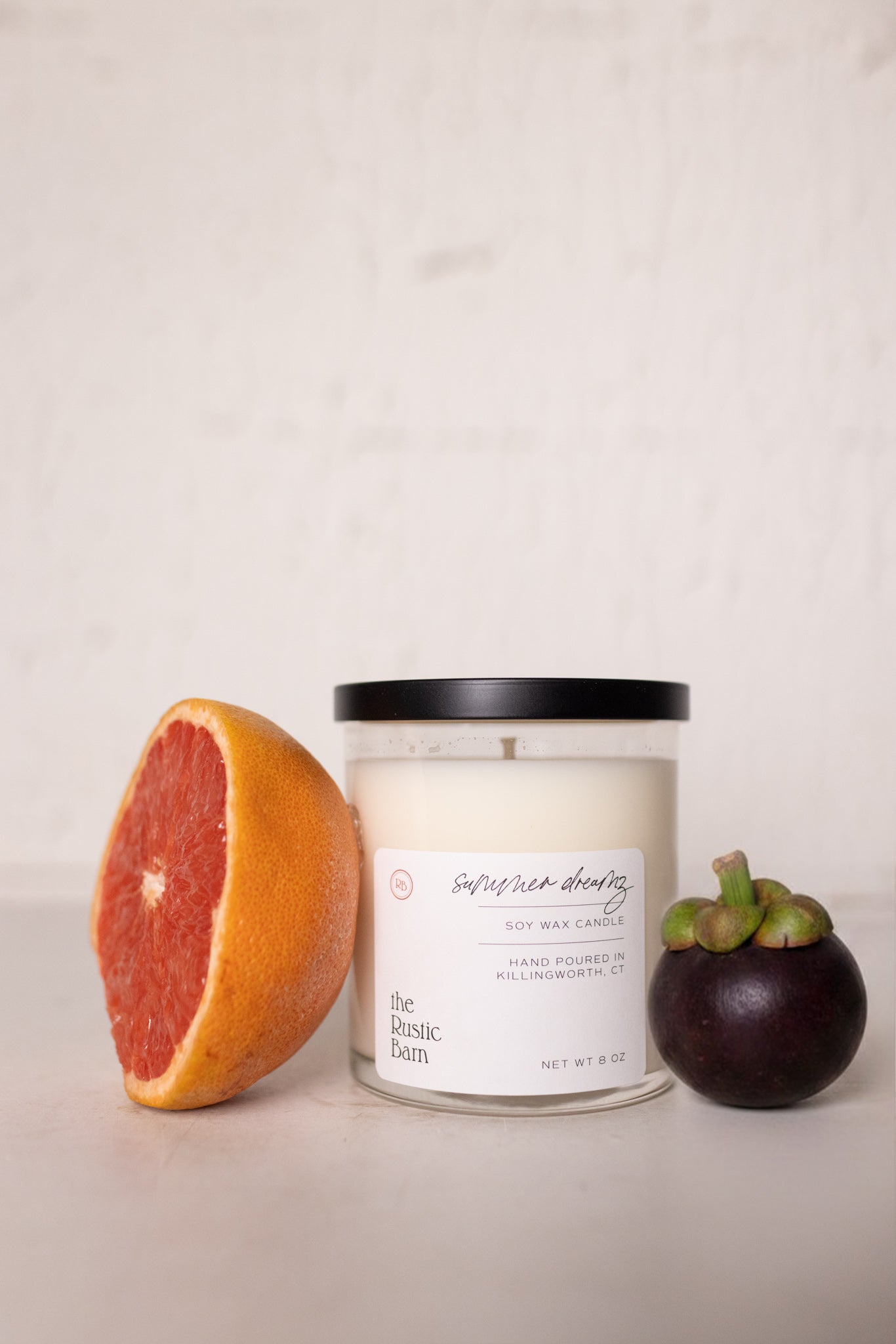 grapefruit and mangosteen hand poured 8 ounce soy candle at the rustic barn in Killingworth ct