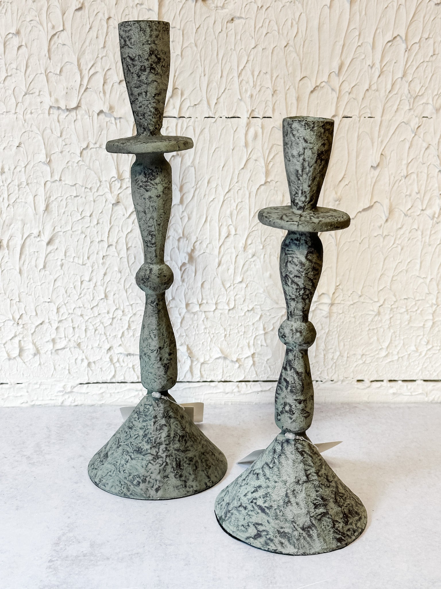 green patina hammered taper candle holders at the rustic barn in killingworth ct