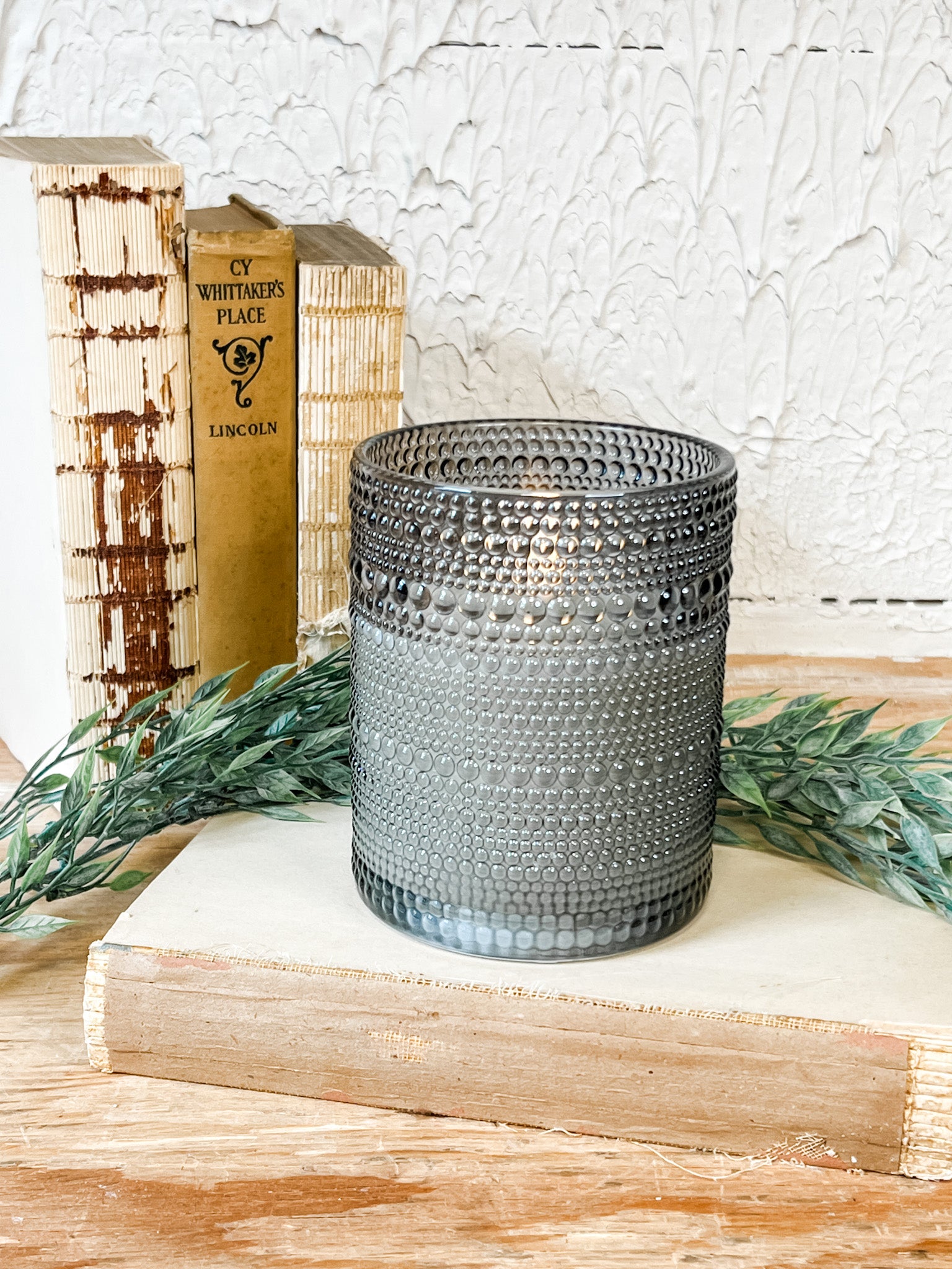 grey dotted glass flameless candle at the rustic barn in killingworth ct
