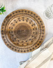hand carved mango wood floral plate charger at the rustic barn in killingworth ct