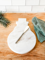 hand crafted marble snowman cheeseboard with knife at the rustic barn in killingworth ct