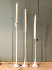 hand-forged metal taper holder with white finish at The Rustic Barn in Killingworth, CT