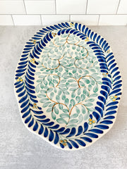 hand painted vine pattern blue and green stoneware oval platter at the rustic barn in killingworth ct