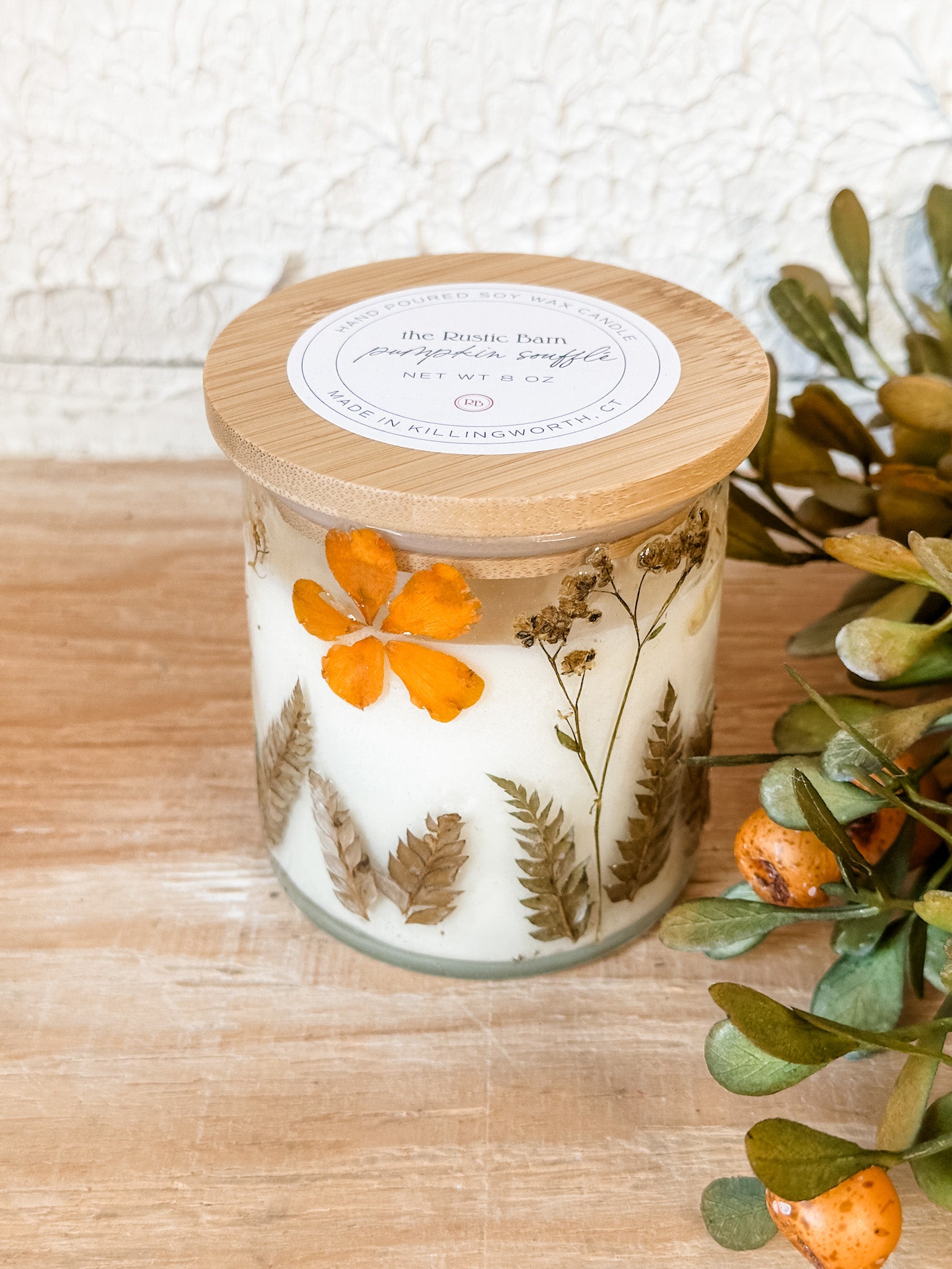 hand poured soy fall candle in a pressed glass specialty jar at the rustic barn in killingoworth ct