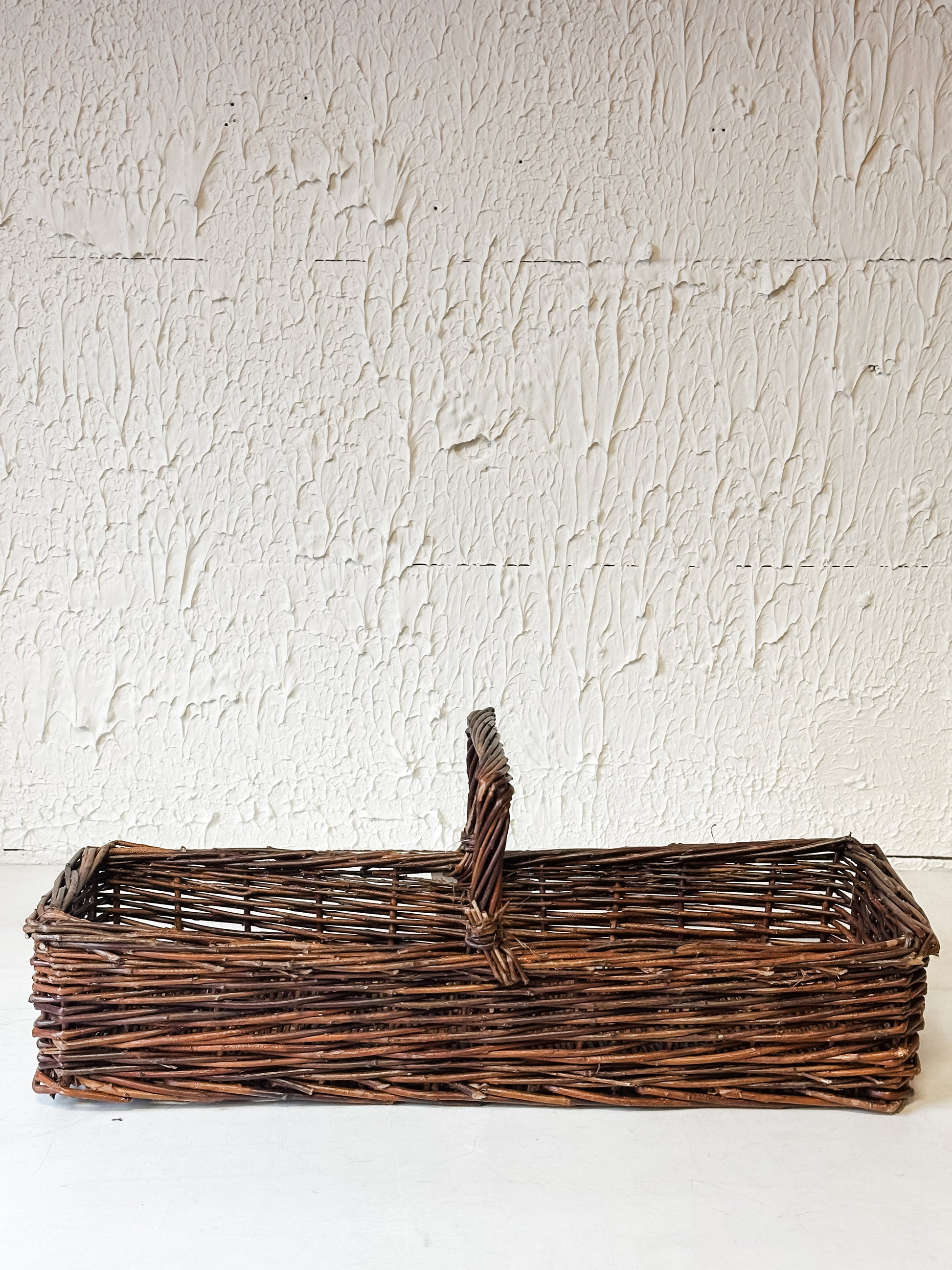 Artisan Hand-Woven Natural Reed Storage Basket with Handle at the Rustic Barn in Killingworth, CT