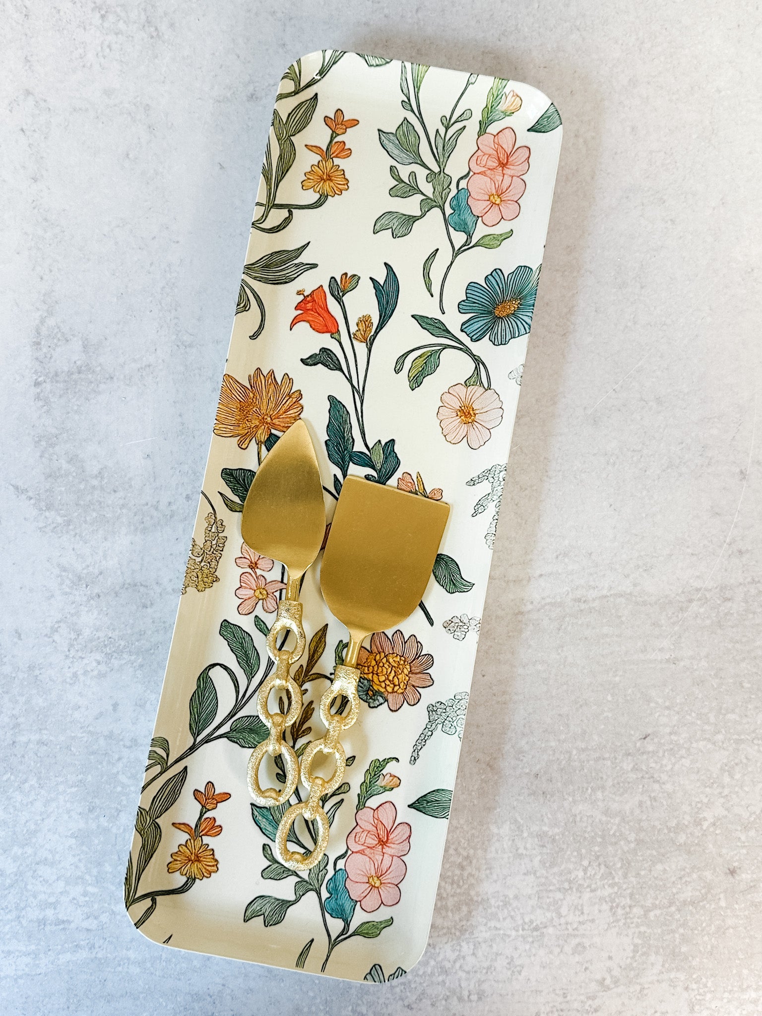 handcrafted iron wildflower wall decor and tray at the rustic barn in killingworth ct
