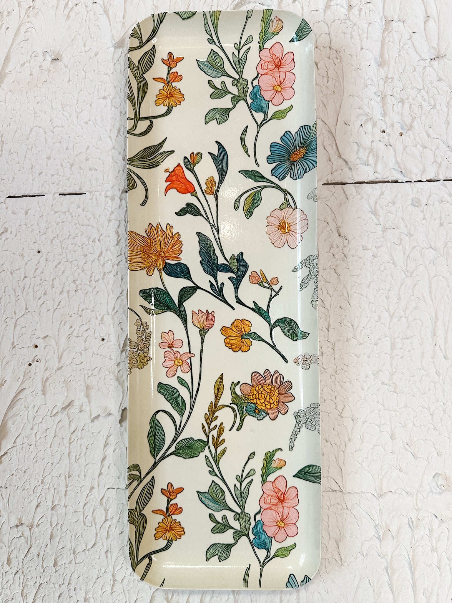 handcrafted iron wildflower wall decor and tray at the rustic barn in killingworth ct