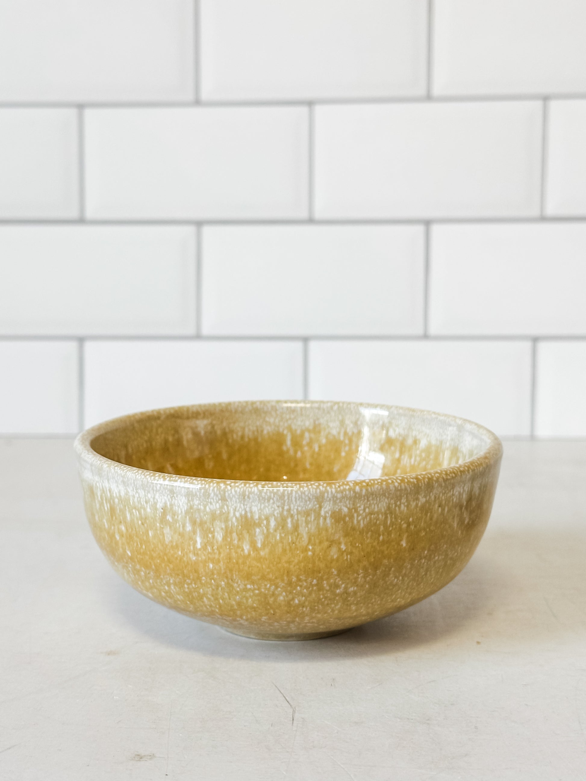 handcrafted stoneware bowls with reactive glaze at the rustic barn in killingworth ct