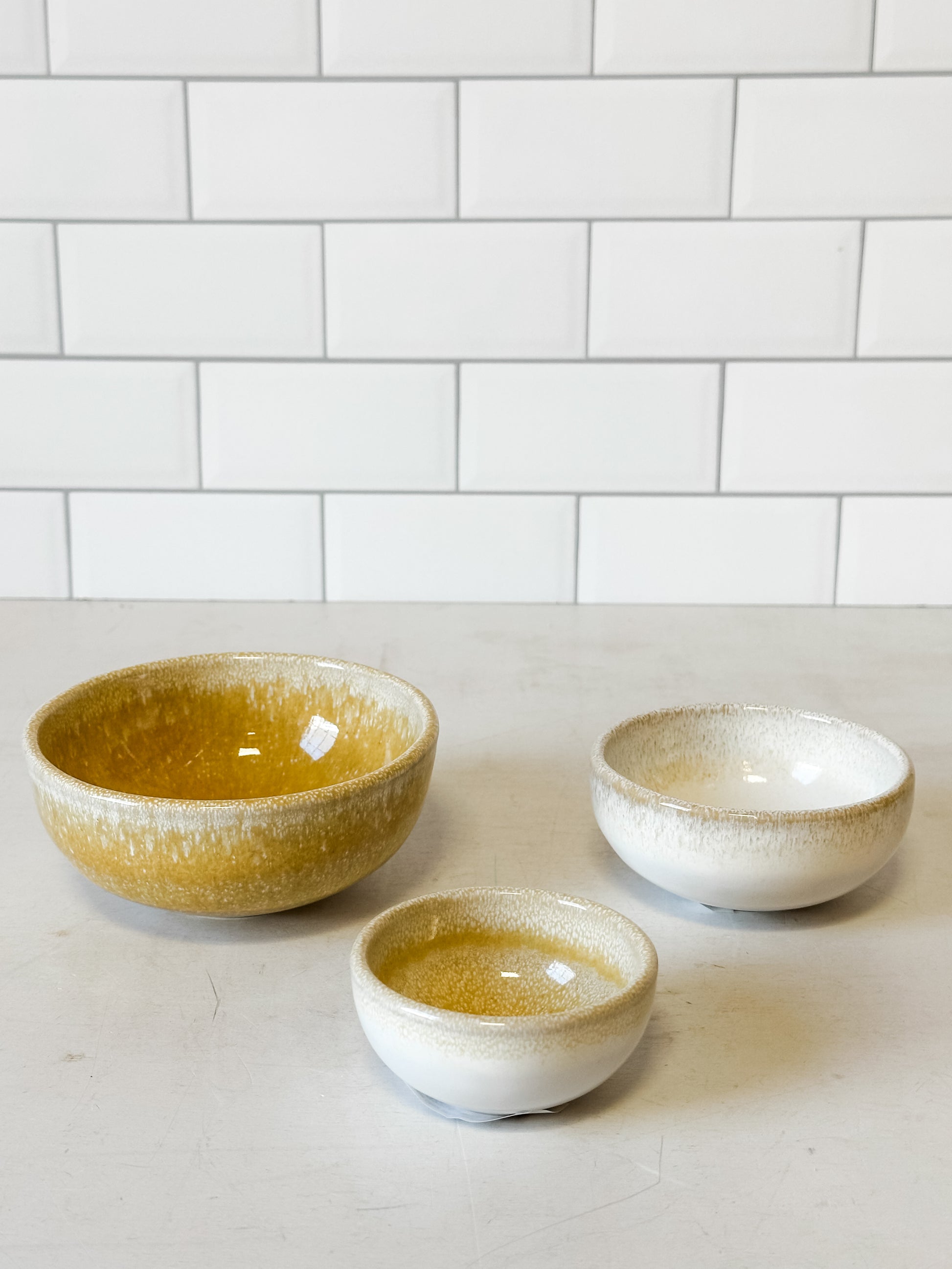 handcrafted stoneware bowls with reactive glaze at the rustic barn in killingworth ct