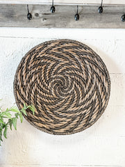 water hyacinth woven medallion wall basket at the rustic barn in killingworth ct