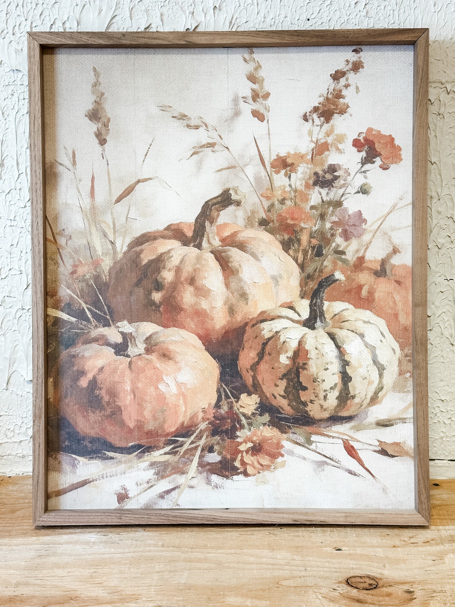 harvest pumpkins and autumg grass wood framed wall art at the rustic barn in killingworth ct