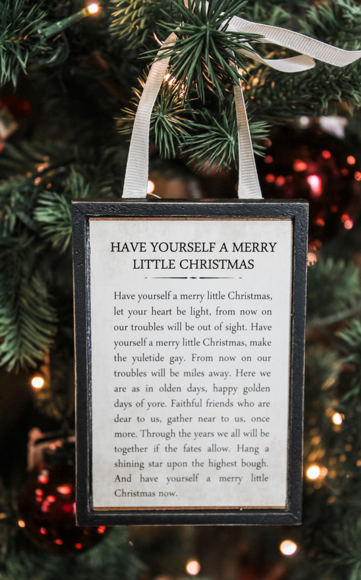 Have a merry little christmas ornament with Christmas wording for holiday trees and gifting for sale at the rustic barn in Killingworth, CT