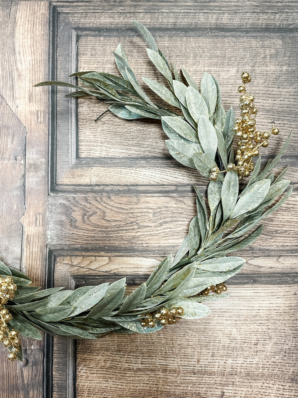 gold berry holiday bay leaf garland for christmas for sale at the rustic barn in killingworth, CT