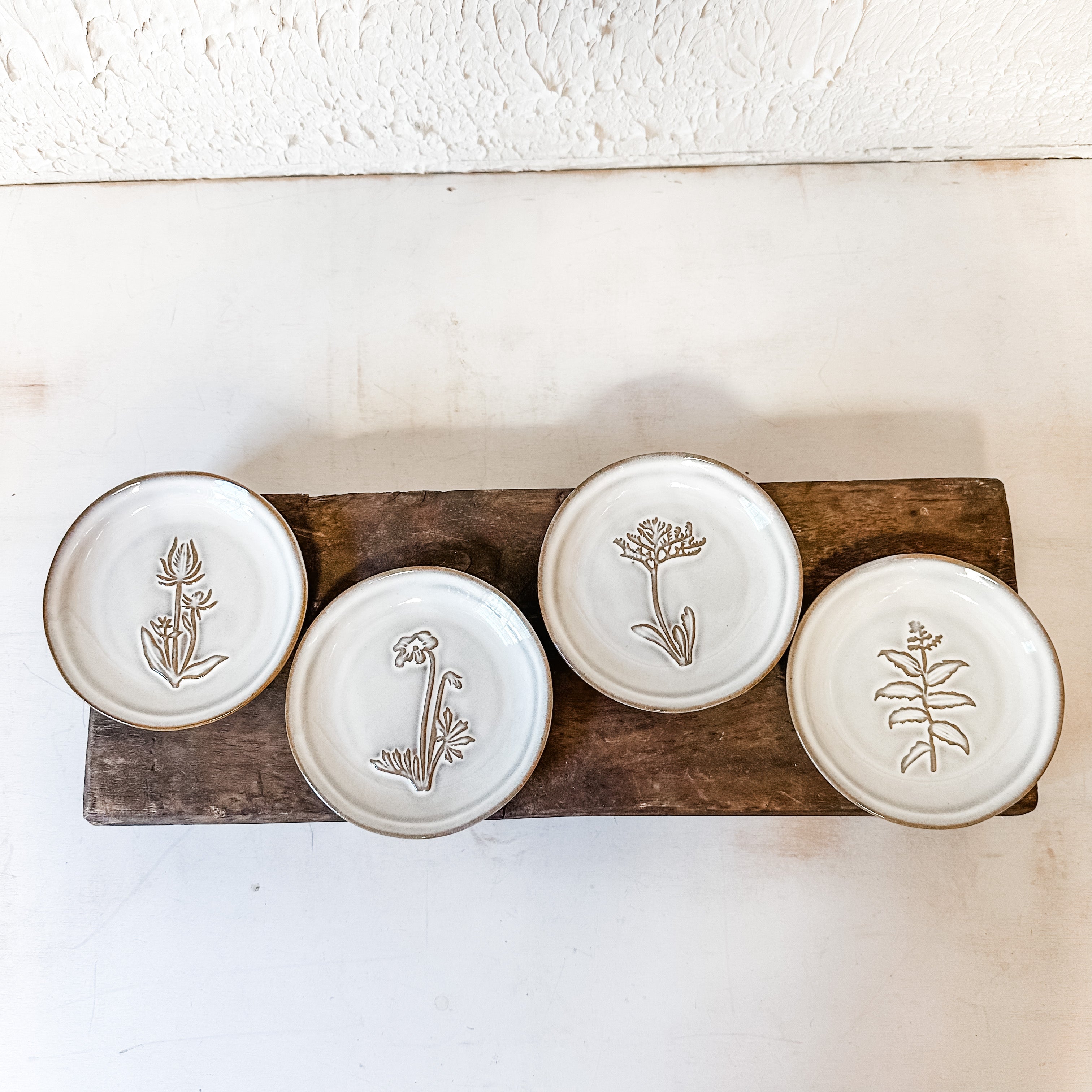 small tapa plates with floral design the rustic barn ct