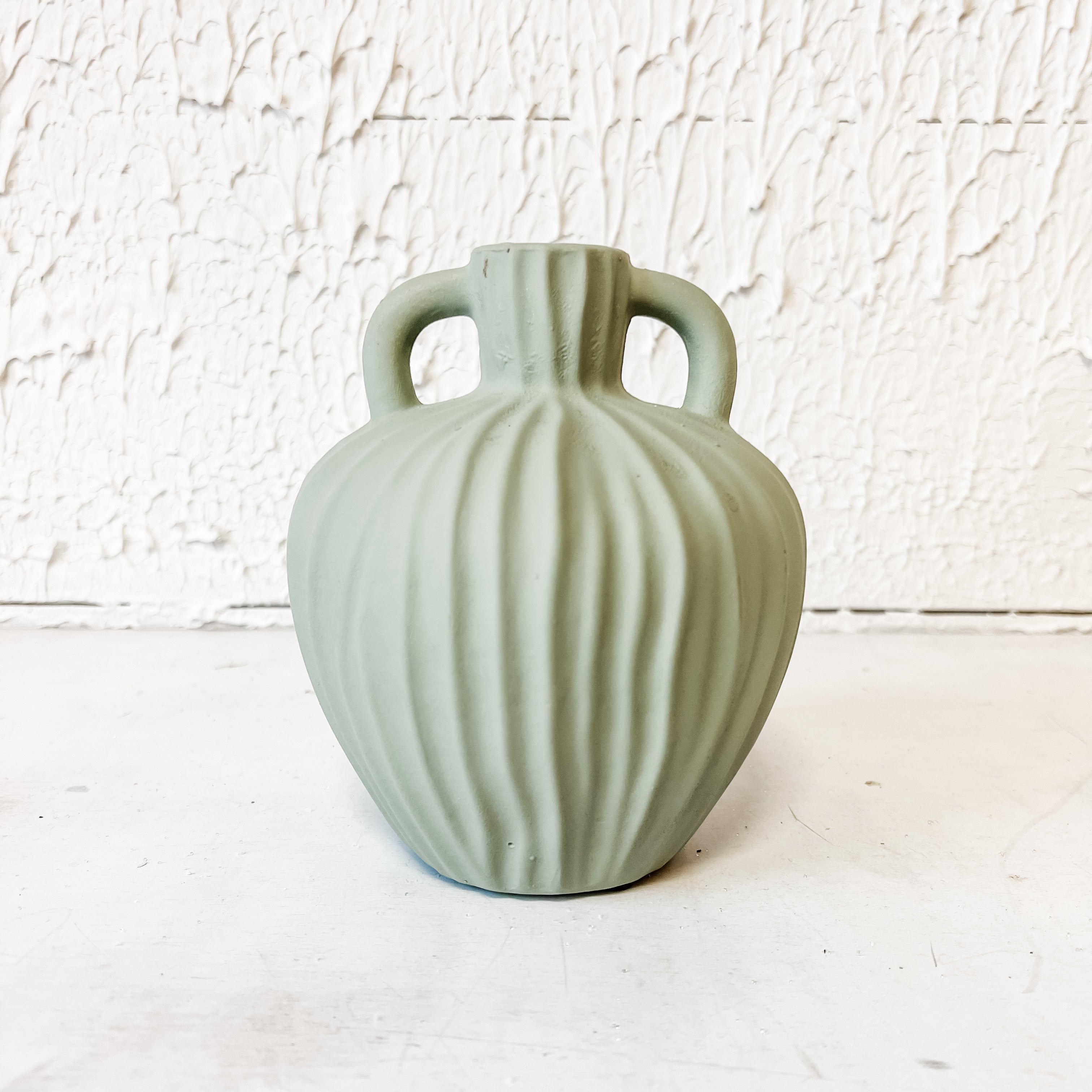 green ribbed vase with a matte finish the rustic barn ct