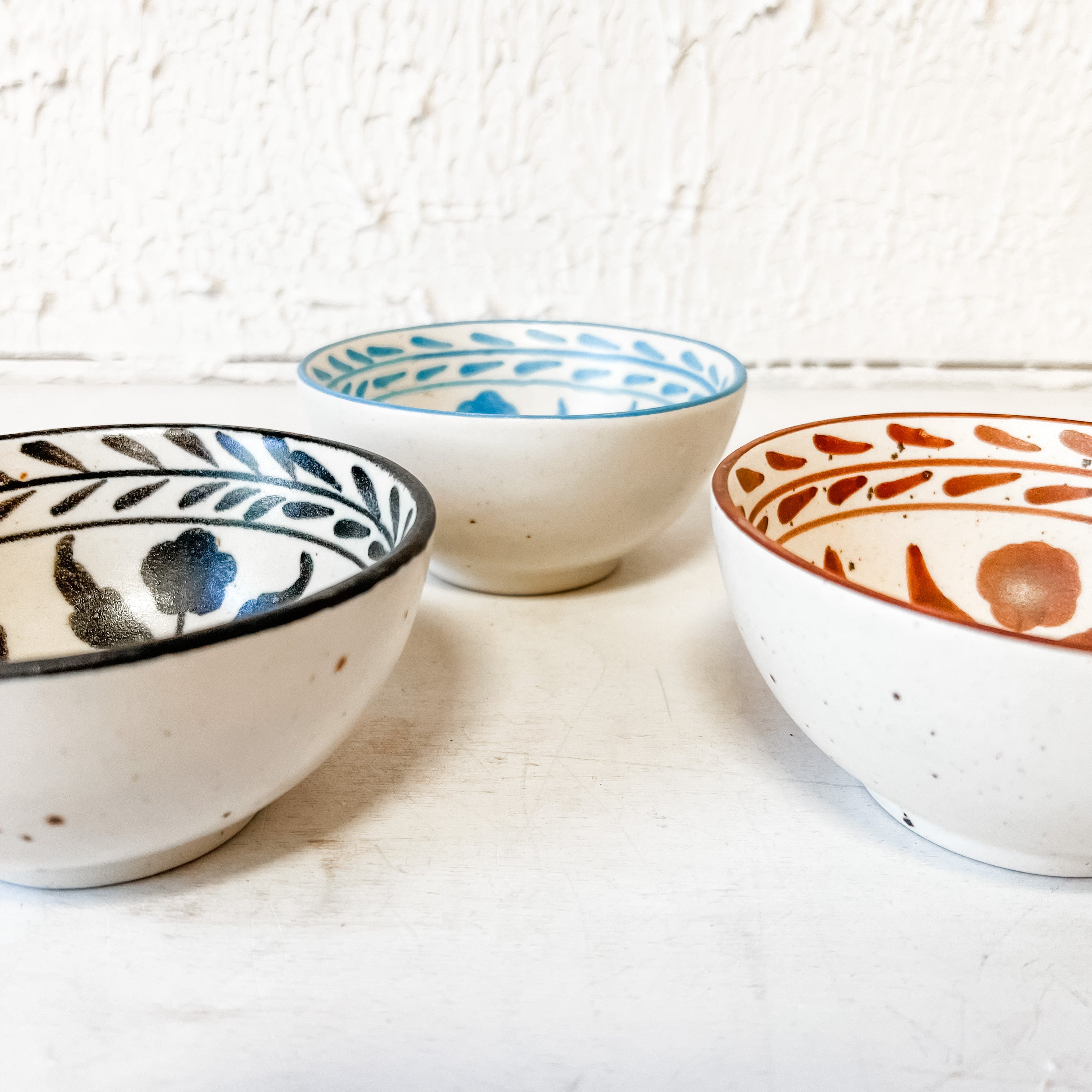 Hand-Painted Stoneware Bowls With Floral Design