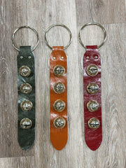 leather and embosses metal bells door hanger at The Rustic Barn in Killingworth CT