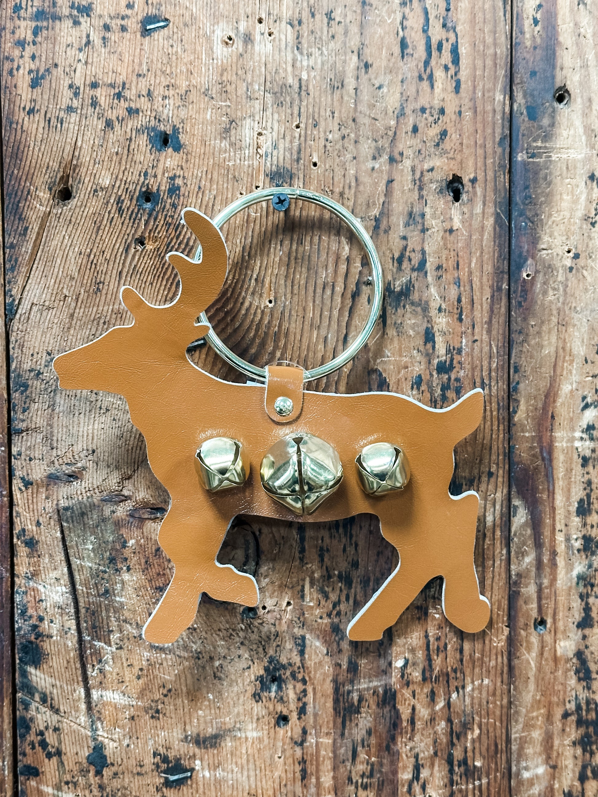 leather deer door hanger with bells at The Rustic Barn in Killingworth CT