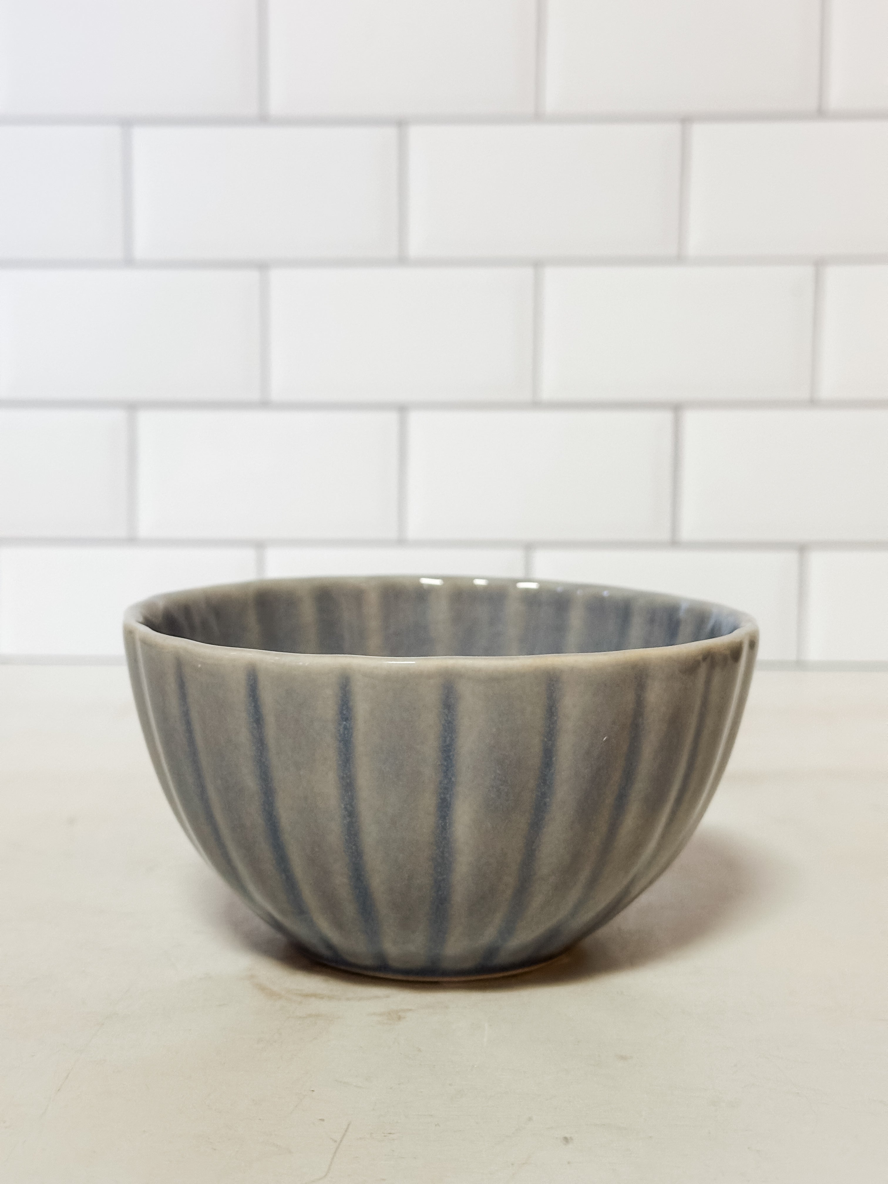 light blue stoneware fluted bowl at The Rustic Barn in Killingworth, CT
