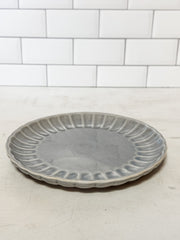 light blue stoneware fluted plate at The Rustic Barn in Killingworth, CT