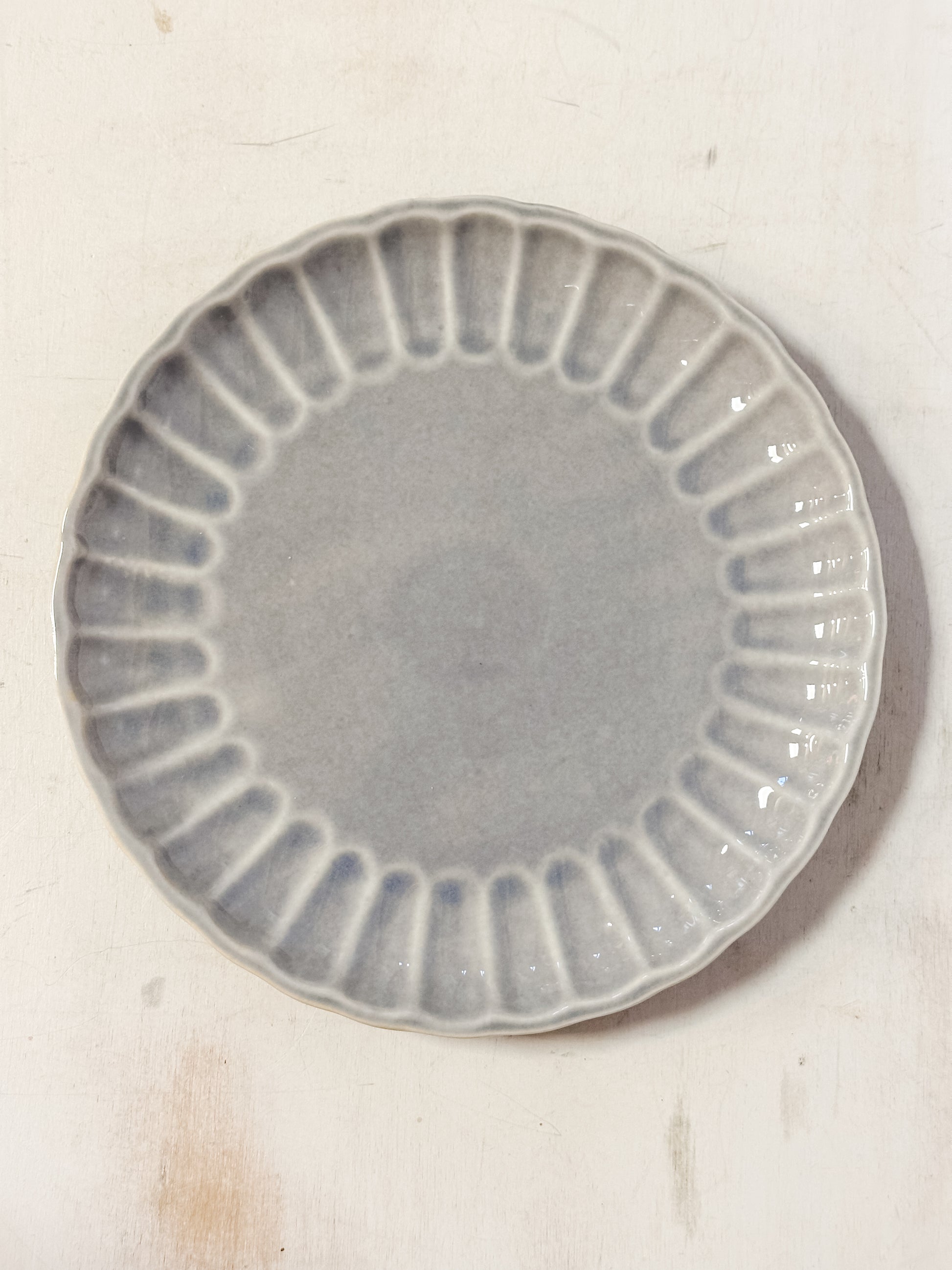 light blue stoneware fluted plate at The Rustic Barn in Killingworth, CT