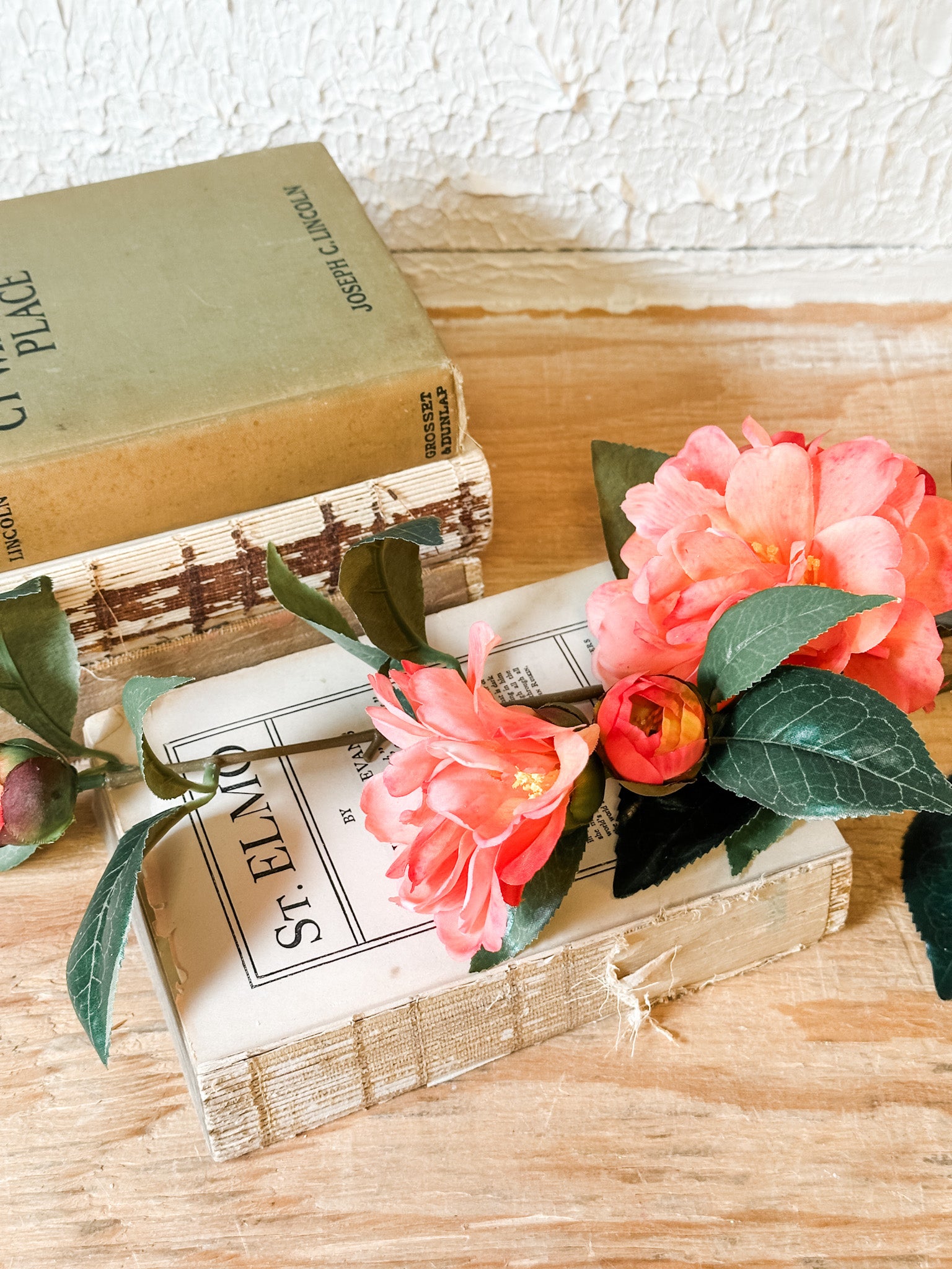 long stem coral silk carmellia flower at the rustic barn in killingworth ct